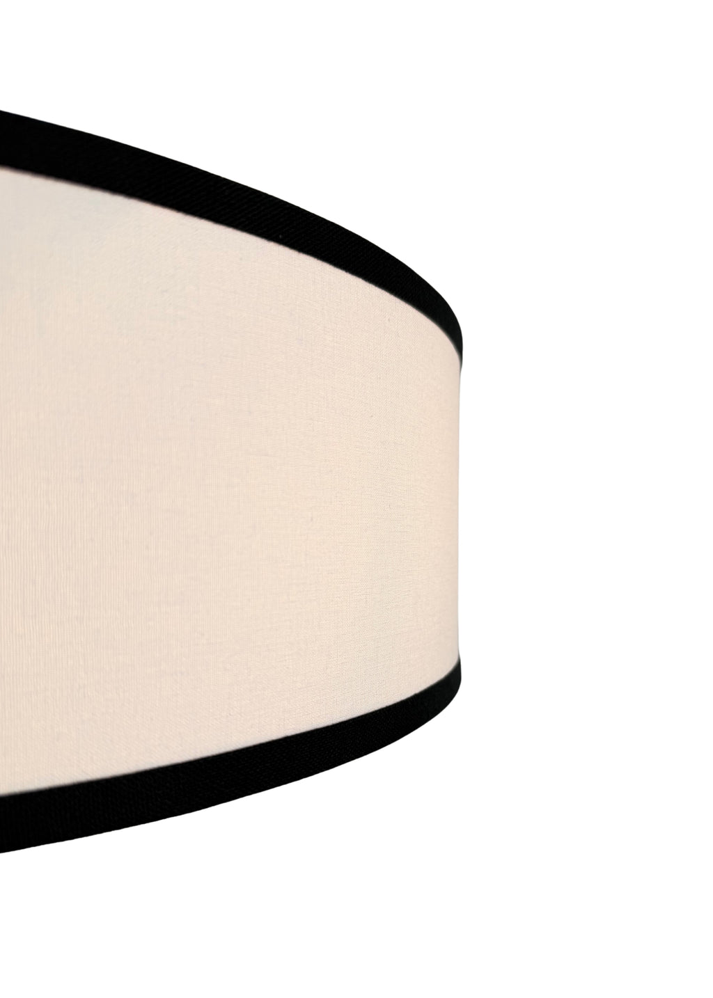 Side view of Haven Flush Mount linen drum shade with black edge