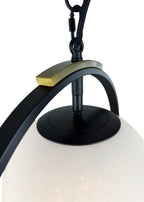 Close-up of Halo Pendant aged brass accent and clouded glass