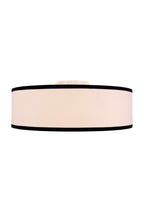 Side view of Haven Flush Mount linen drum shade with black edge