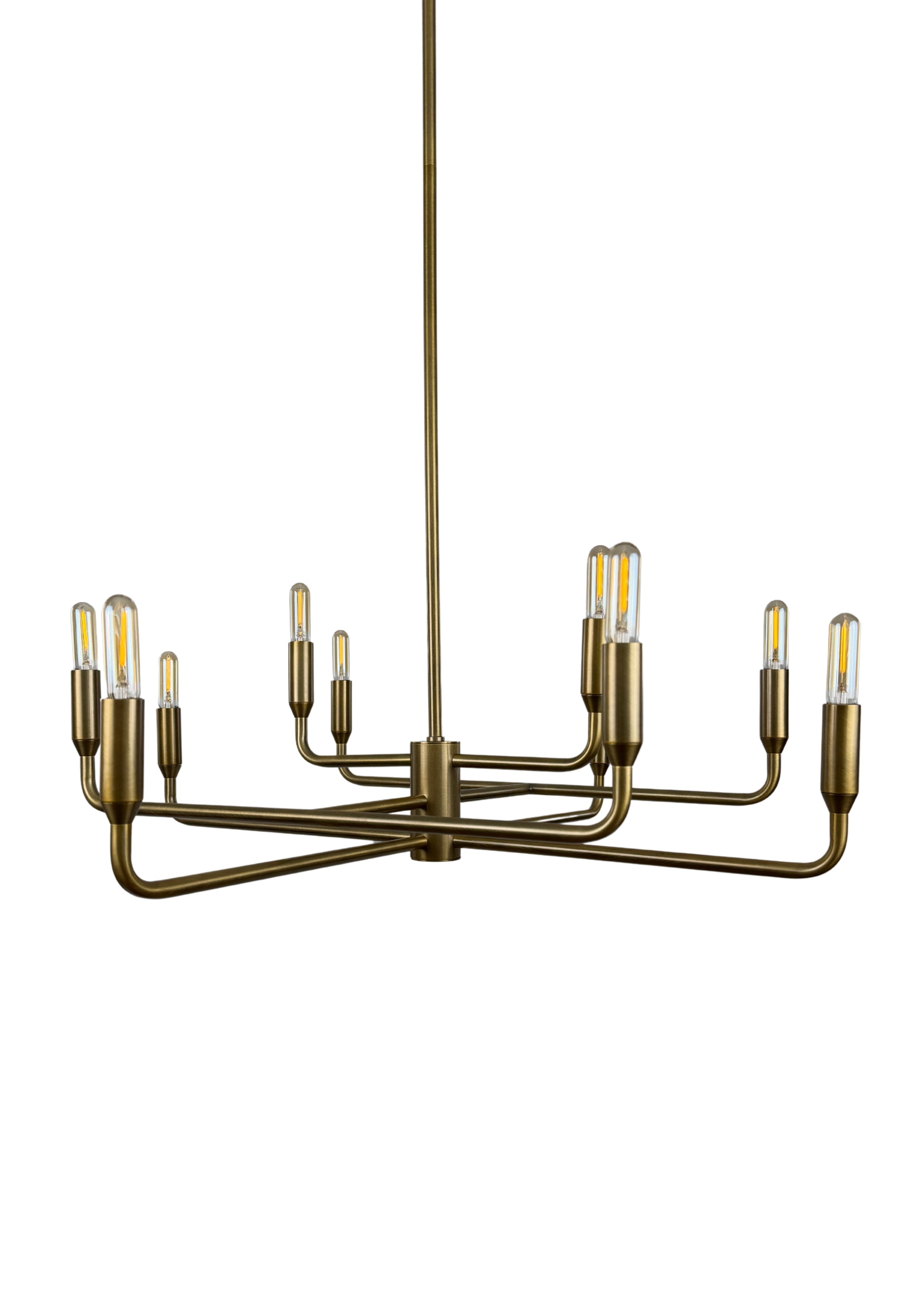 Close-up of Mercer Chandelier aged brass finish and curved steel arms