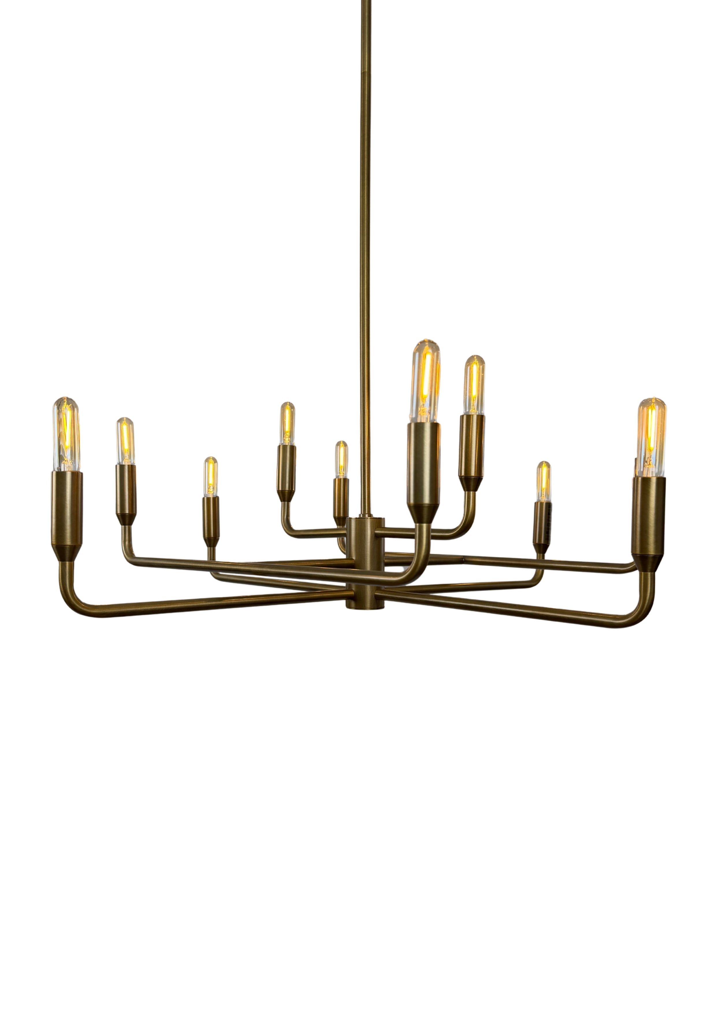Close-up of Mercer Chandelier aged brass finish and curved steel arms