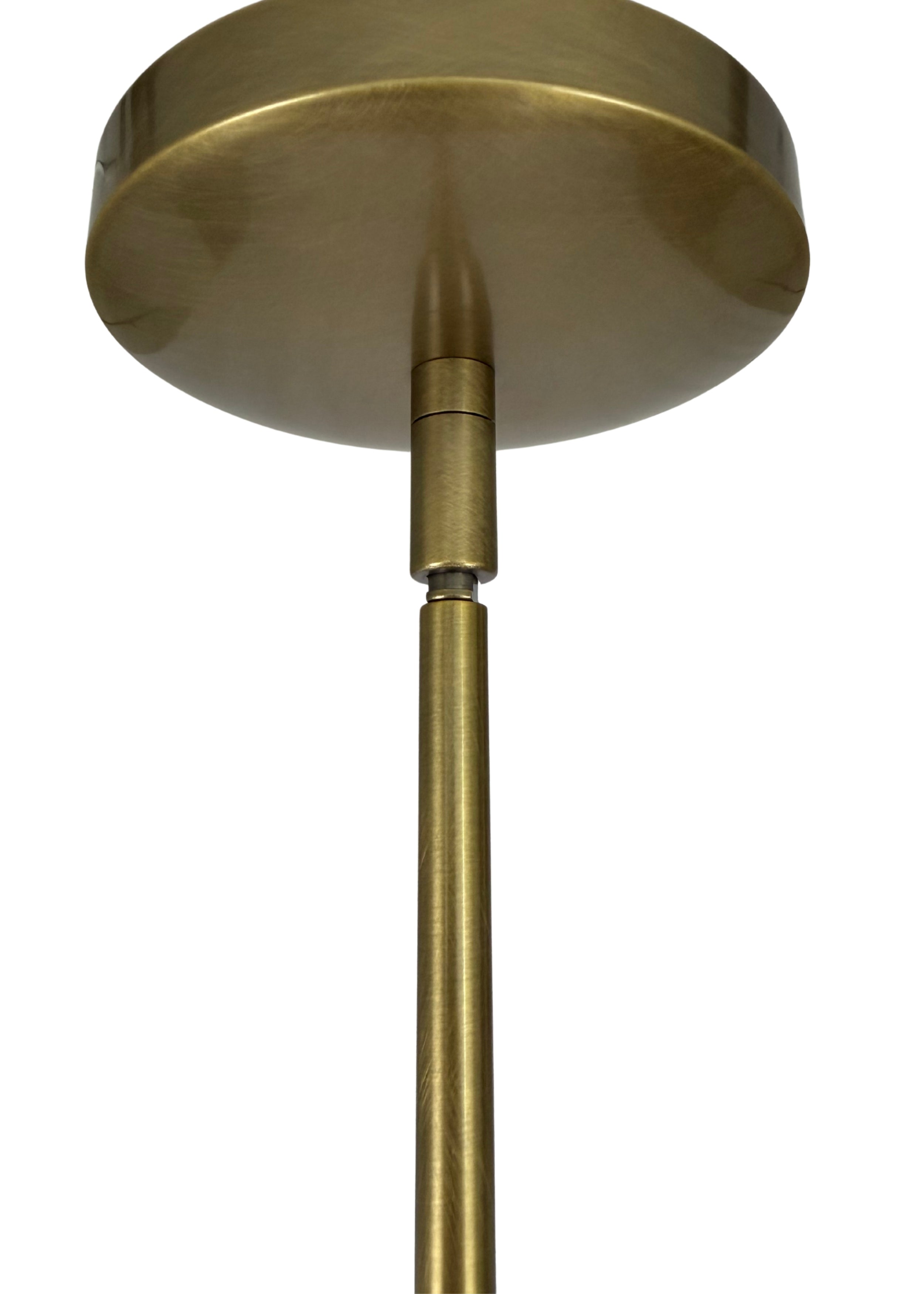 Close-up of Orion Chandelier aged brass canopy and pole