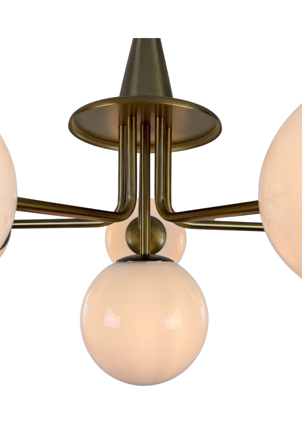 Close-up of Orion Chandelier aged brass frame and milk glass shade